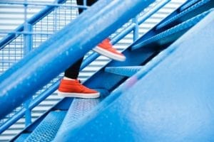 external testing team represented by feet going up stairs