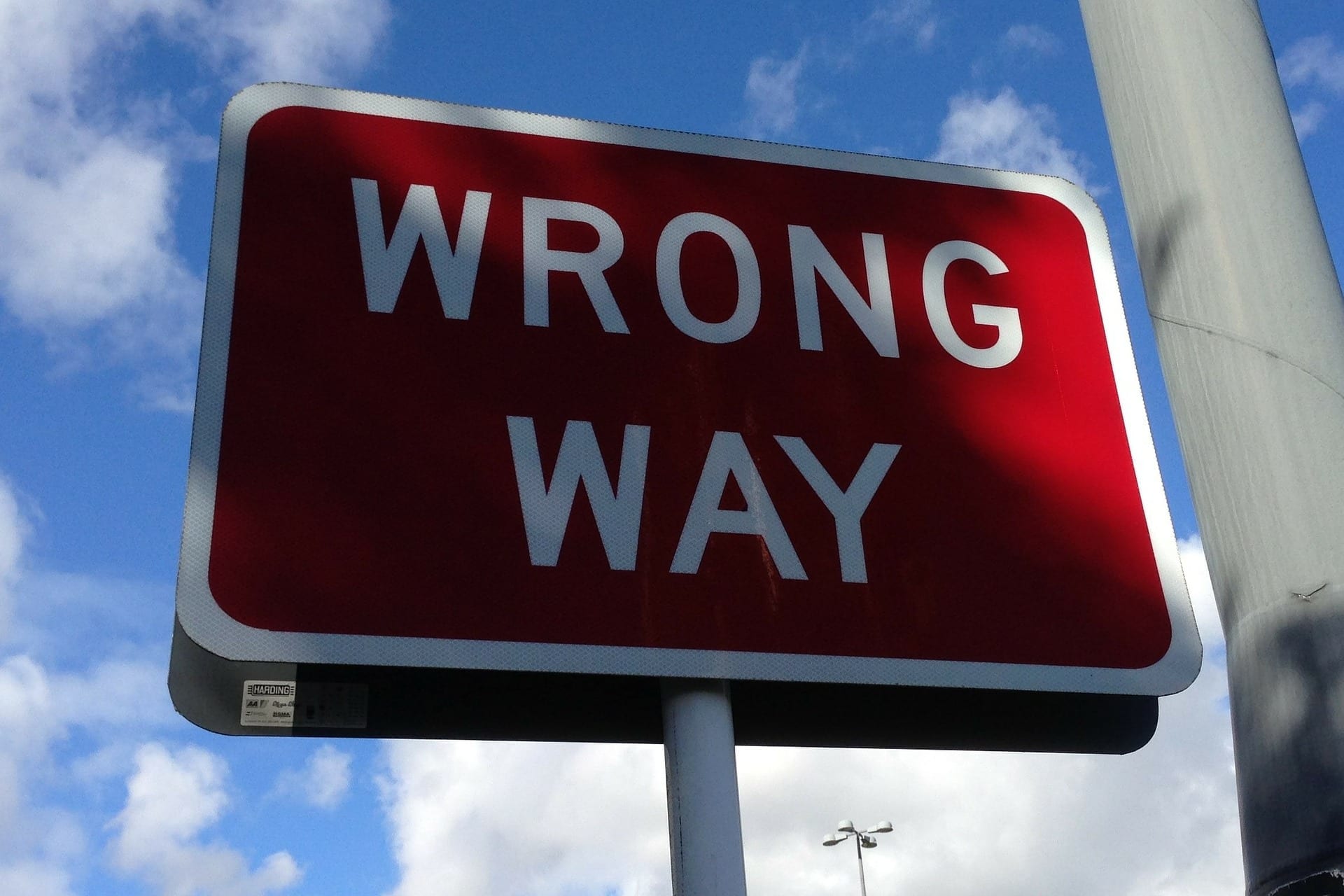 misconceptions about software testing represented by wrong way sign