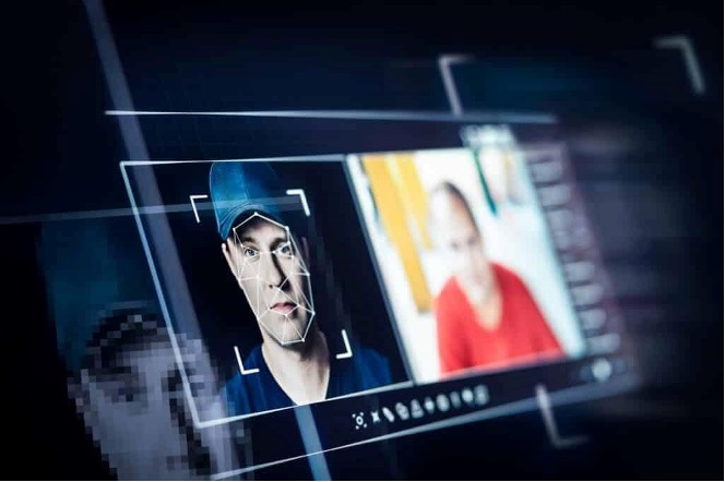 Biometric facial recognition screen showing a person’s face being analyzed, representing injection attack detection and biometric security testing